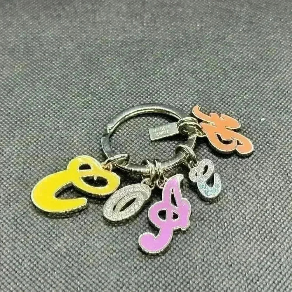 COACH* Jeweled Rhinestone COACH Script Letters Keychain Charm 92690